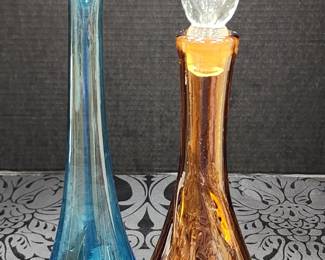 Mid century modern glassware. Genie bottle and swung vase.