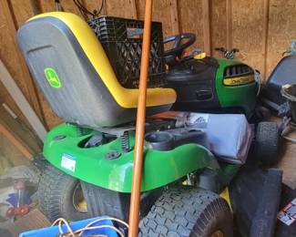 John Deere sitting lawn mower