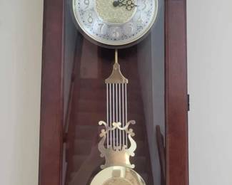 Howard Miller wall hanging pendulum clock