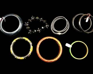 Black Bangles Including One Bakelite, Horn, Malachite, And Stone Bangles