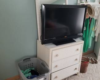 Three-drawer wicker chest; TV
