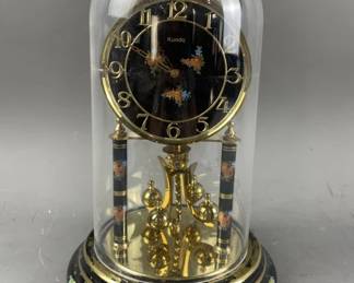 Lot 373 - Black Floral Face Kundo Mantle Clock