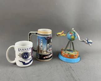 Lot 379 - Airplane Tin Toy & Space Items