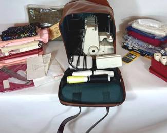 Singer Sewing Machine And Various Fabrics