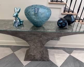 Goatskin console table and Murano glass.