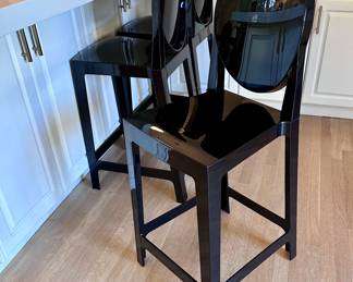 Black ghost barstools.