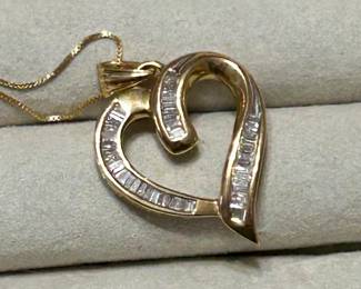 diamonds and gold bezel set heart pendant with chain