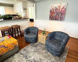 blue fabric barrel swivel chairs