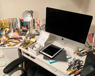 other angle of pc, antique office supplies and tablets 