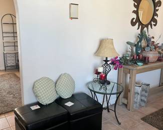 2 ottomans in great condition, 2 small pillows and some frames on the wall