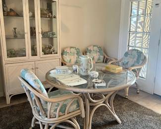the Golden Girls table and chairs, the chairs are on wheels, Mikasa tea pot and other treasures in China cabinet as well