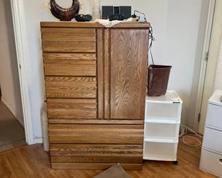 dresser and some storage containers along with a iPod and Phillips station. Beautiful vase as well.