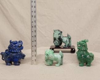 Another view of the pair of Chinese carved hardstone foo dogs or temple lions, one with wooden stand; and a pair of Chinese carved hardstone incense censers in the form of mythical auspicious beasts 