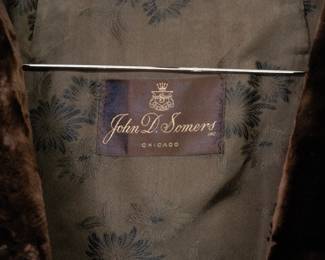 Closeup of a vintage rich deep brown fur coat with shawl collar by John D. Somers Inc., Chicago