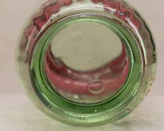 Closeup of the 19th century Rubina Verde enamel decorated art glass vase