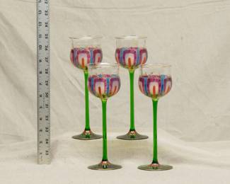 A set of four antique Art Nouveau hand blown wine goblets with Uranium Glass stems and hand painted crystal bowls, c 1900, probably Hohes Stängelglas Meyr's Neffe.