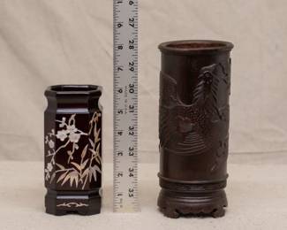 Two carved Chinese brush pots, one with inlaid mother of pearl in a bamboo and plum blossom motif, one carved with a phoenix bird flying amongst clouds