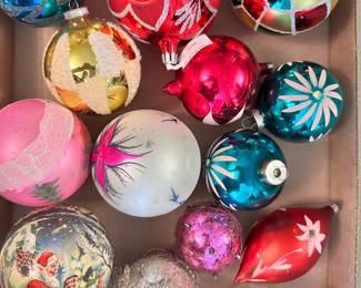 Classic vintage Christmas ornaments, many with hand painted decoration