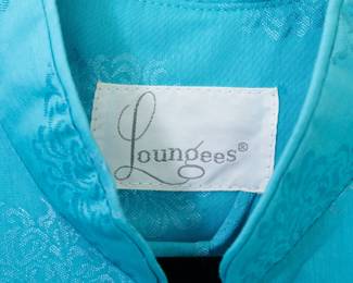 Closeup of new with tag NWT light blue Loungees Chinese style house coat, brocaded chrysanthemum pattern