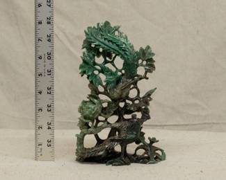 A large Chinese spinach jade carving of a phoenix bird in a flowering tree peony 