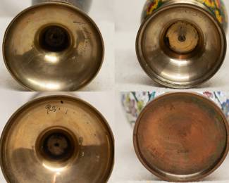 Closeup of the bases of three pair of graceful etched and cloisonné vases