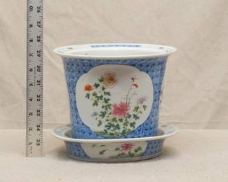 A vintage Chinese porcelain jardiniére or cache pot with tray, underglaze blue with hand painted famille rose enamels of flowering chrysanthemums