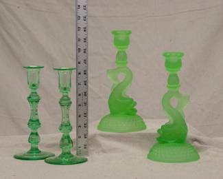 A pair of Cambridge Emerald Dolphin frosted uranium glass candlestick holders, and a pair of EAPG green uranium glass candlestick holders