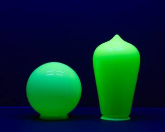 Seen under black light: Antique hand blown uranium glass light shades circa 1900