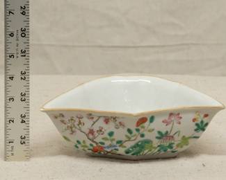 Another view of the Chinese export porcelain polychrome enamel bowl in bat form with floral decoration including lotus, chrysanthemum, peony, plum blossoms; six-character mark on base.