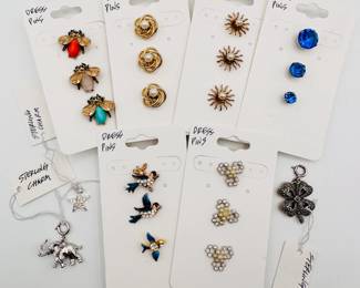 Vintage sets of dress pins, birds and bees and sparkly rhinestones; also, sterling silver charms