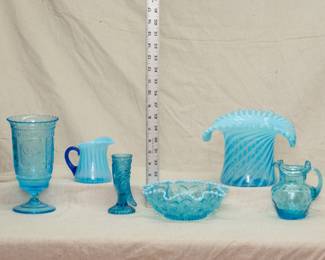 Fenton Glass including a 1920's Fenton Glass blue opalescent rib optic pitcher with dark blue handle, early 1930s Fenton blue Daisy and Button hand cornucopia glass vase, and a Fenton spiral optic blue Top Hat vase