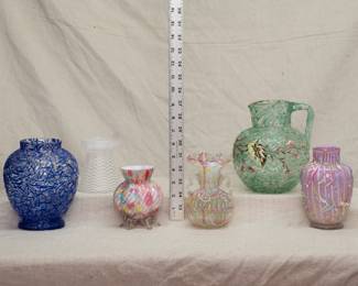 Beautiful art glass including a Harrach Glass ovoid form pitcher with green Peloton decorated with a flowering branch, a cased rainbow glass aventurine ribbed vase with applied clear glass feet, and a clear glass with pastel Peloton vase with ruffled rim and applied twin handles