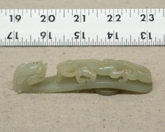 Another view of the Chinese carved jade "dragon" belt hook, carved with a scroll form chilong facing a dragon head terminal
