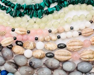 Closeup of natural stone bead necklaces, polished, carved, faceted, some with sterling silver clasps. Choose your colors, length, style!