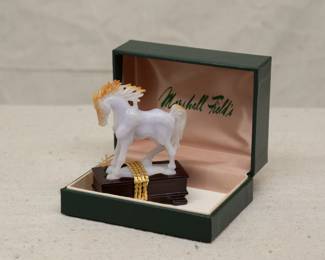 Another view of the Chinese lavender jade carved figure of a horse with wooden stand