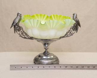 True Gilded Age glamor with this antique cased art glass bride's basket held in an ornate silver plated stand with perched parrots, the stand made by E. G. Webster Bro N.Y., both pieces circa 1870s–1880s.