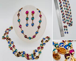 A Swarovski Crystal hallmarked gold-tone multi-color crystal gripoix bead parure of jewel tone poured glass beads in a set of clip earrings, a choker length (16-inch) necklace and a rope or lariat (36-inch) necklace. Colorful, versatile and stylish!
