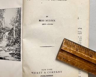 Inside pages of antique printing of John Halifax, Gentleman by Miss Mulock (Mrs Craik), leather bound in what appears to be crocodile skin; Hurst & Company Publishers New York