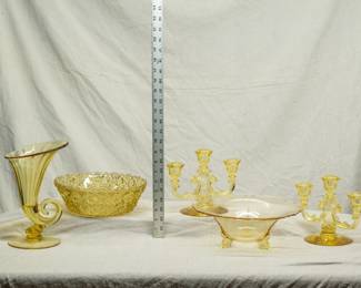 A Cambridge Glass topaz "Cornucopia" 3900/575 vase, a pair of Fostoria topaz Trindle candlestick holders, and more