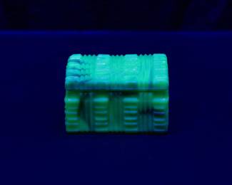 Seen under black light: A vintage Akro Agate Company uranium glass slag glass lidded trinket or powder box
