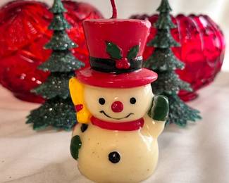 A vintage snowman Christmas candle