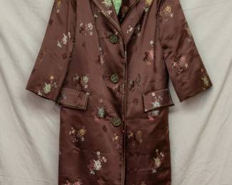 A beautiful vintage embroidered silk coat by Johnson Tailors Ltd in Kong Kong, rich coffee brown silk embroidered with multicolor flowers, and spring green silk lining