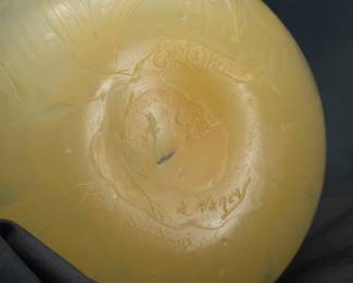 Closeup of the Émile Gallé Nancy signed art glass vase, pale gold color with graceful floral design