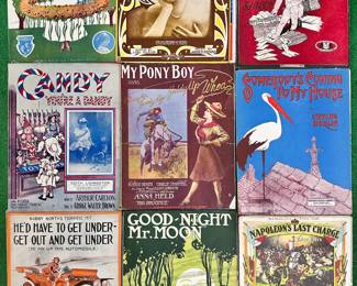 Antique sheet music available at this sale, including I'll Make A Ring Around Rosie by Jerome & Schwartz, V.V.'s Eyes by Lou Klein and James Kendis, Drop a Line to Cupid y S. J. Raber, Candy You're A Dandy by Arthur Carlton and George Walter Brown, My Pony Boy by Bobbie Heath and Charlie O'Donnell, Somebody's Coming to My House by Irving Berlin, He's Have to Get Under Get Out and Get Under to Fix Up His Automobile by Grant Clark and Edgar Leslie, Good-Night Mr. Moon by Eli Dawson and Albert Von Tilzer, Napoleon's Last Charge by Edw. Ellis