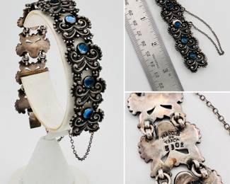A rare and gorgeous 1950s vintage Margo de Taxco sterling silver and blue stone bracelet, curving scrolled and beaded links set with blue stones. Marked Margot de Taxco, design #5302, eagle 16, Sterling Made in Mexico.