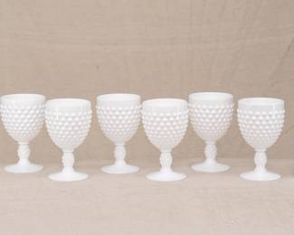A set of six Fenton Art Glass Company white milk glass hobnail water or wine goblets