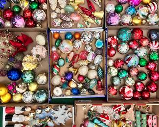 Tons of vintage blown glass Christmas Tree ornaments, many German! Many table top Christmas decorations including flocked red reindeer figures, hand-painted porcelain choir singer figurines; new in box vintage NOMA Christmas lights, brilliant color ornaments in pine cone, bugle, ball, icicle shapes some with hand painted decorations; table top Christmas trees and Waterford Crystal holiday ornaments, tinsel garlands, so much classic holiday decorations to choose from!