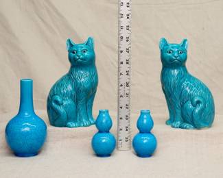 A Chinese porcelain turquoise glaze bottle vase with carved floral decoration, a large pair of beautifully modeled porcelain cat figurines, and a small pair of Chinese porcelain turquoise glaze double gourd form vases with carved floral decoration 