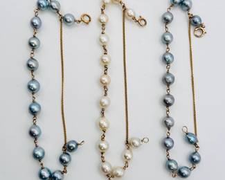 Another view of the three natural pearl and 14k gold bracelets