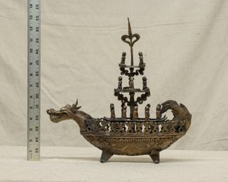 A brass South East Asian dragon form boat